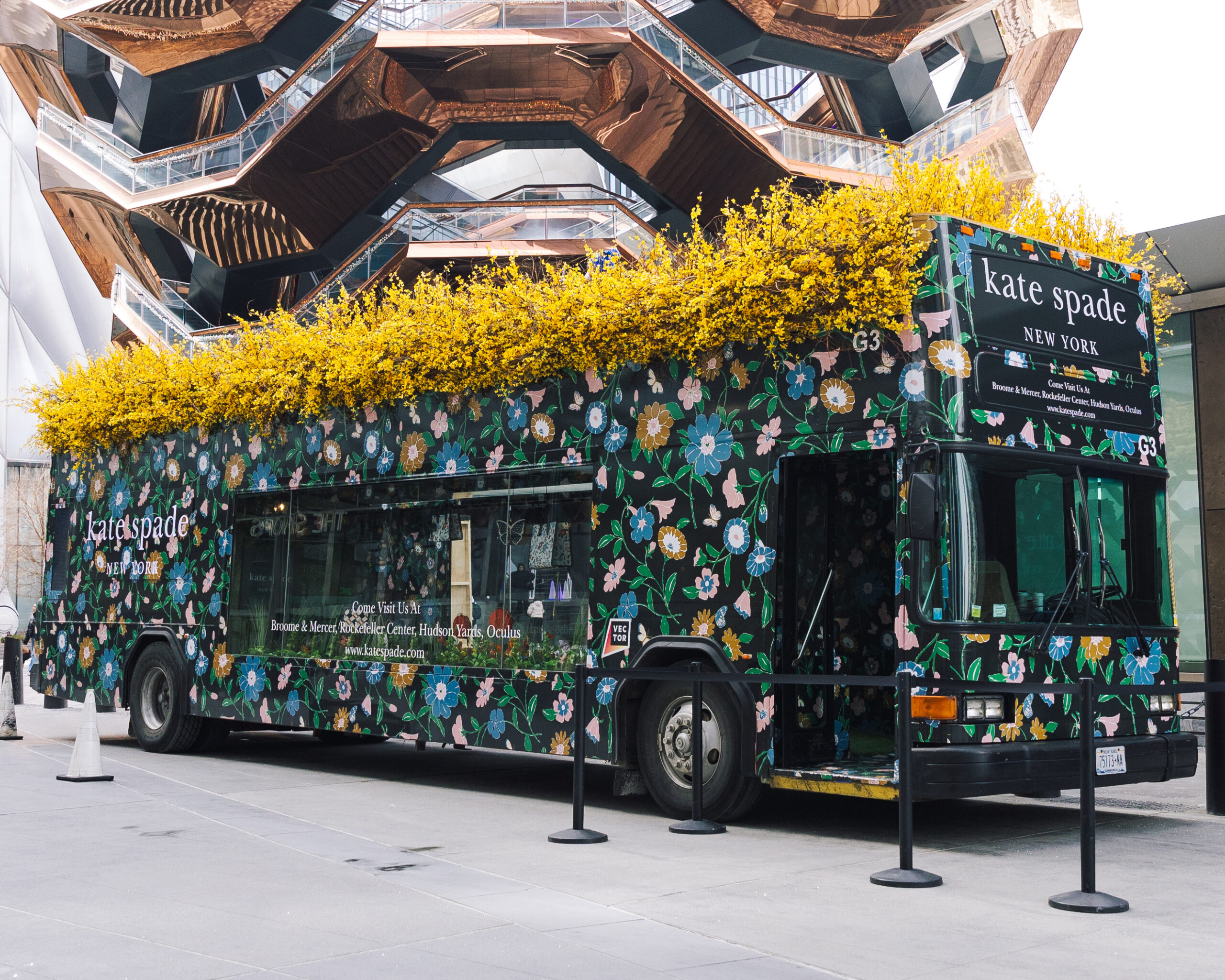 https://nycplugged.com/wp-content/uploads/2023/04/kate-spade-bus-scaled.jpg